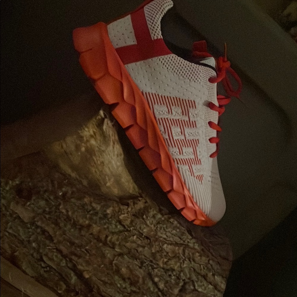 On Cloud White and Red Athletic Shoes